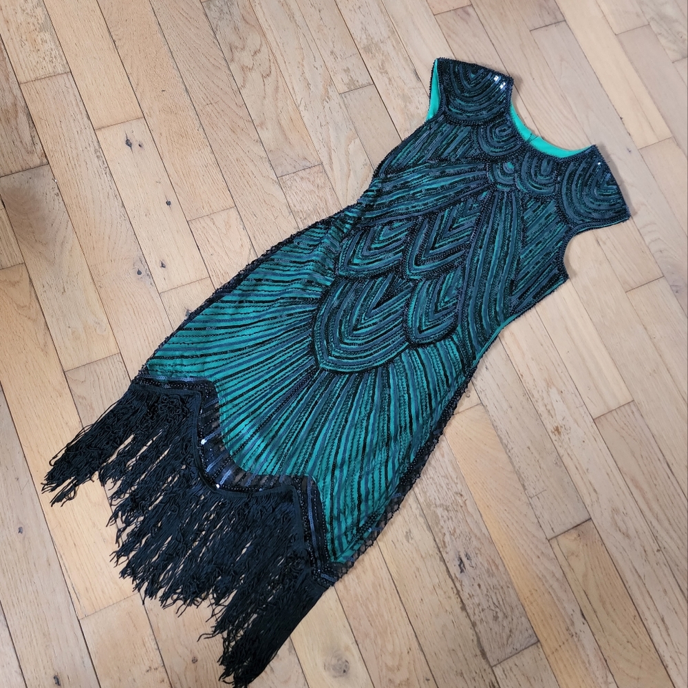 Beaded dress with fringe at bottom